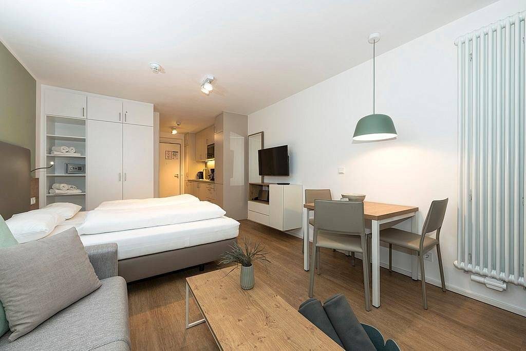 Zentrales Apartment mit sonniger Terrasse, Sauna im Haus - nur 300 m zum Strand! — Bild 2