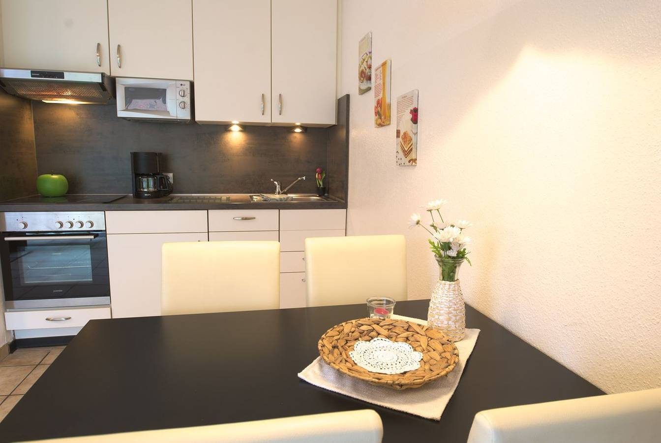 Ferienwohnung für 3 Personen in Strandnähe mit kleiner, eingezäunter Terrasse. — Bild 2