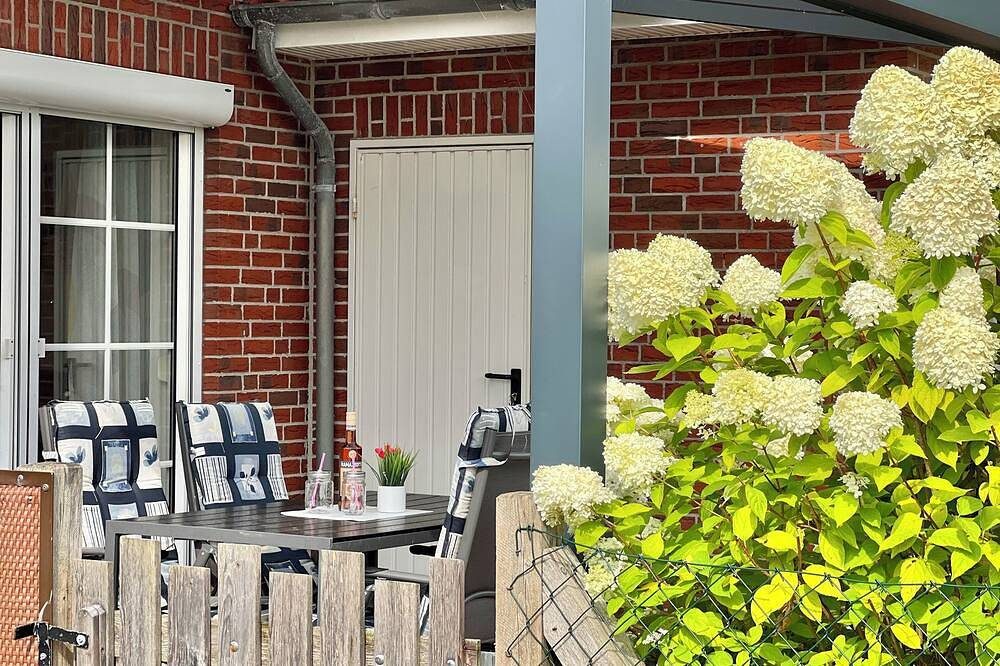 Familienfreundliches Ferienhaus in Deichnähe, Terrasse und Garten — Bild 3