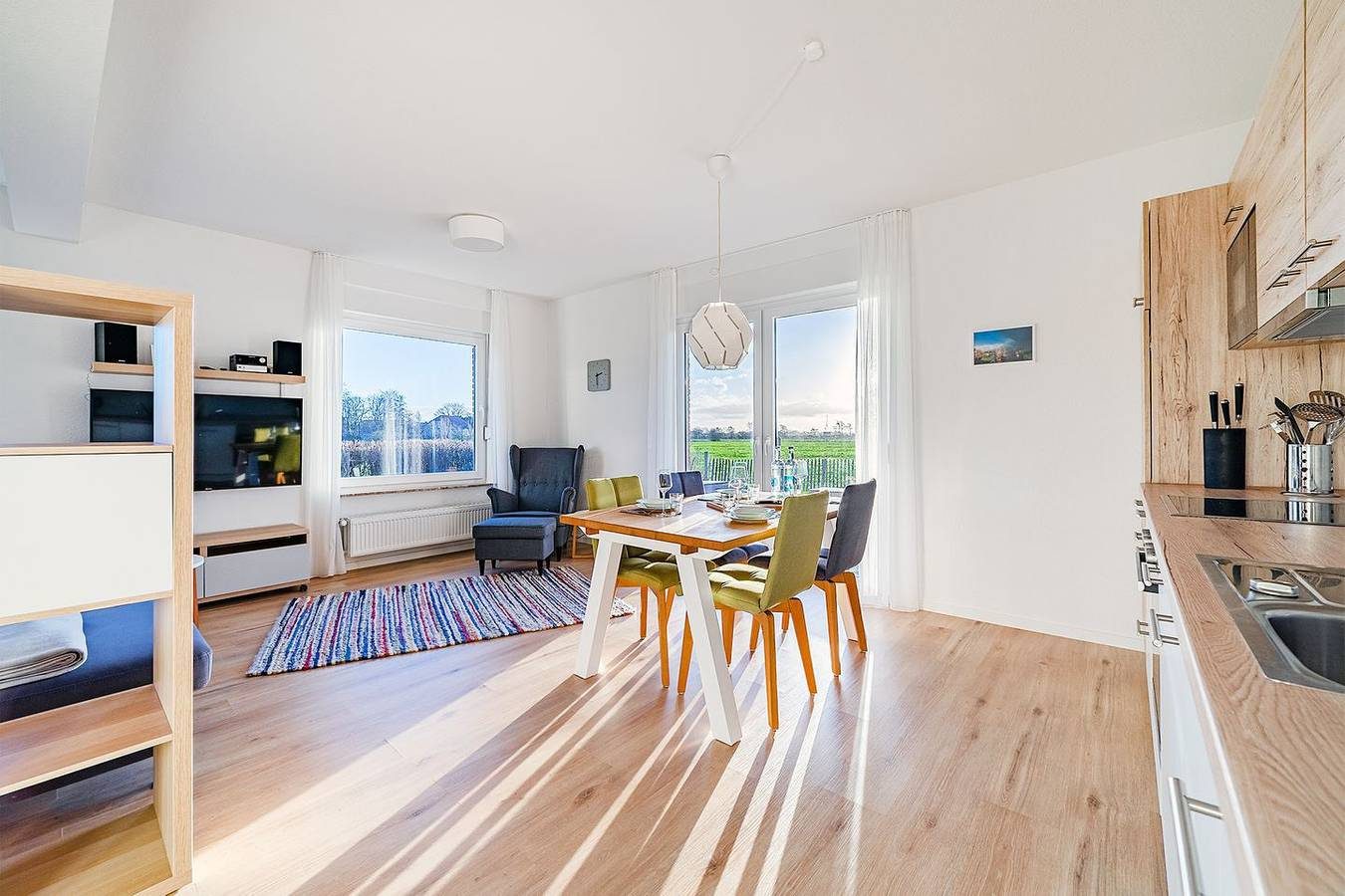 Moderne Ferienwohnung "Köken" mit Blick auf die Greetsieler Zwillingsmühlen