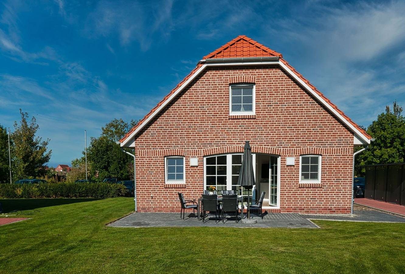 100qm Ferienhaus mit Infrarotkabine, Kamin, Garten & überdachter Terrasse