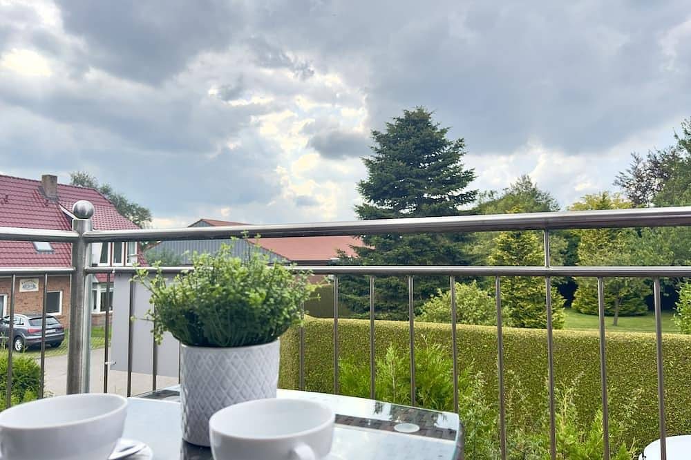 Küstenzauber: 70m² Ferienwohnung für bis zu 4 Personen mit Balkon — Bild 4