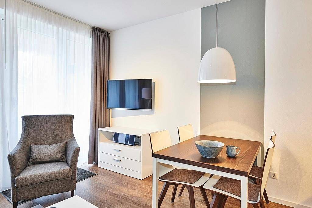 Strandnahes Apartment mit zwei Terrassen inkl. freier Schwimmbad- & Saunanutzung — Bild 3