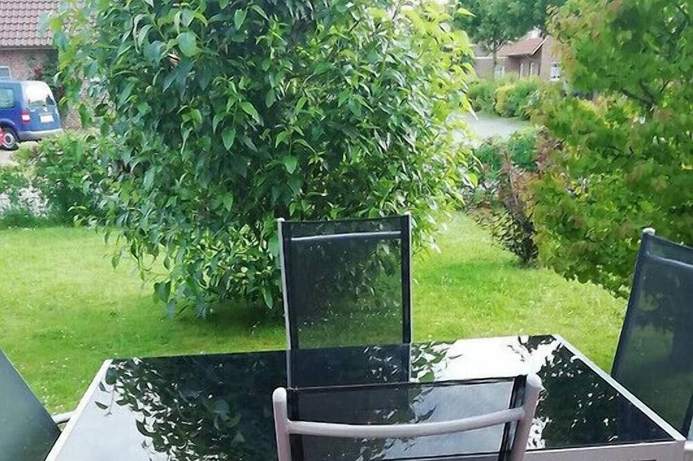 Strandnahe Ferienwohnung mit Terrassen und Garten — Bild 2