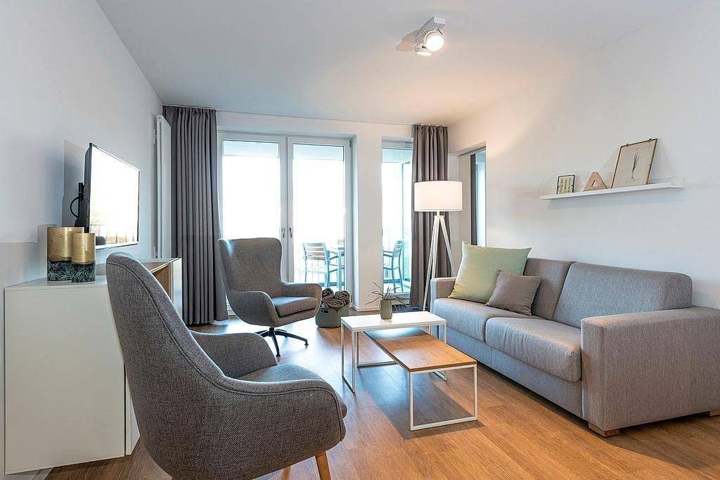Top Apartment in Strandnähe mit Loggia, Strandkorb, zwei Bädern & Sauna im Haus! — Bild 2