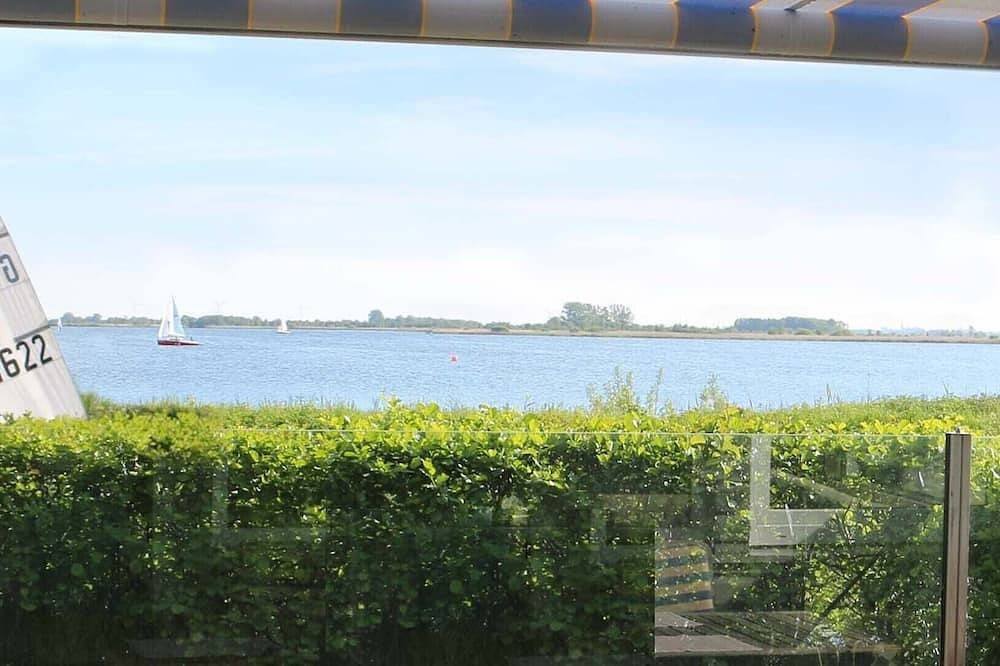5 Sterne Ferienhaus mit freiem Seeblick, direkter Wasserlage und eigenem Steg. — Bild 3