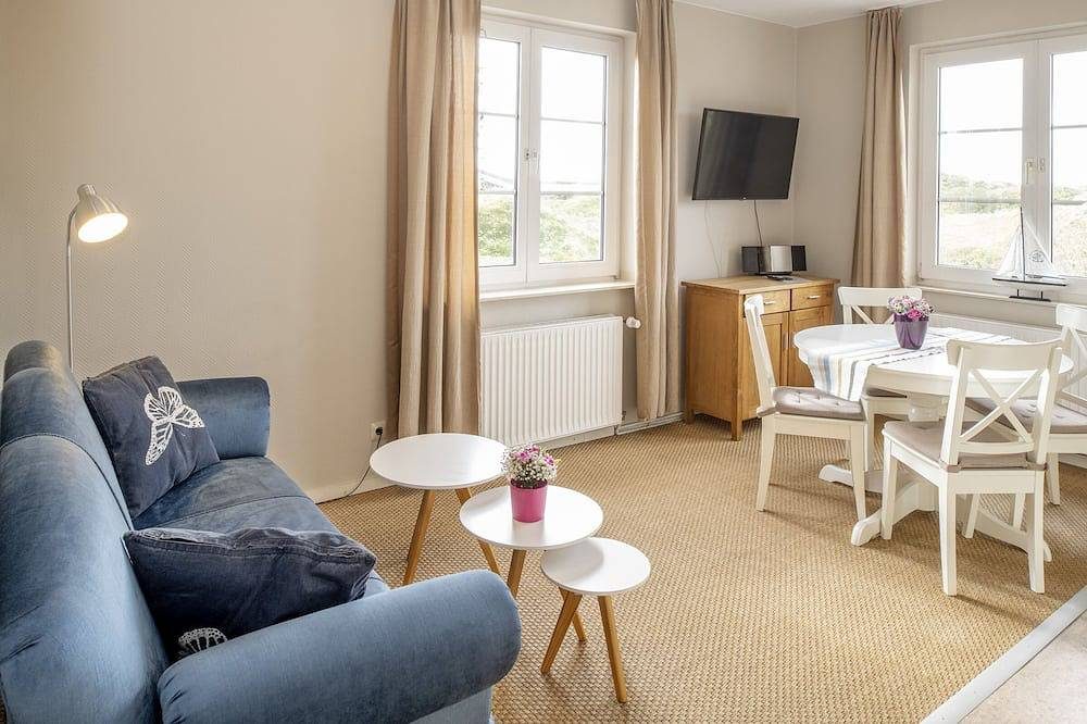 Helle Ferienwohnung auf Langeoog mit Gartennutzung für bis zu vier Personen