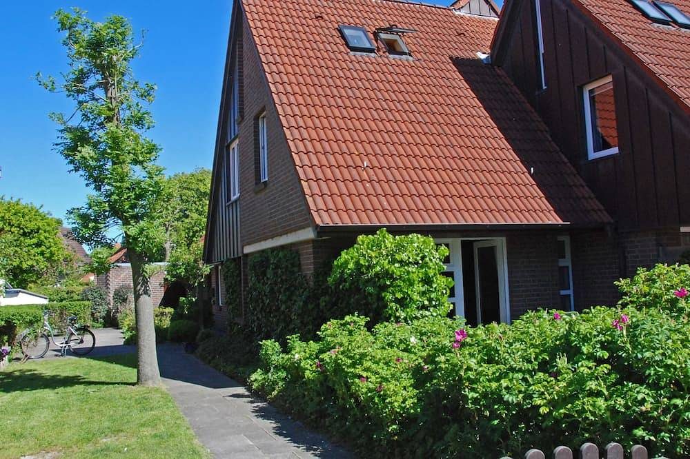 Langeoog: Gemütliches Ferienhaus mit Sonnenterrasse