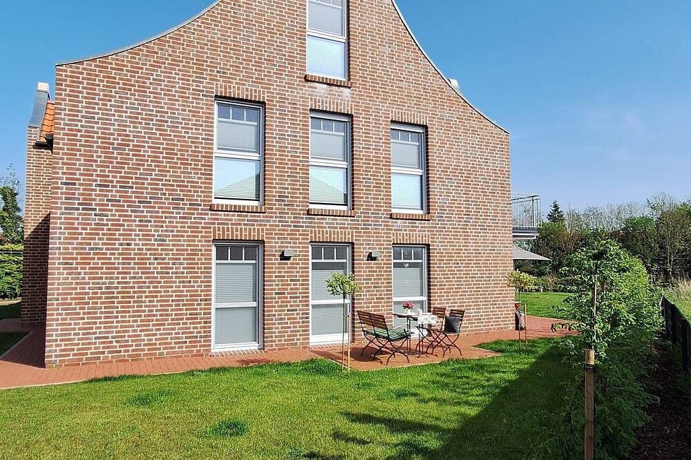 Familienfreundliche Erdgeschosswohnung mit großzügigem Garten und Wasserzugang — Bild 4