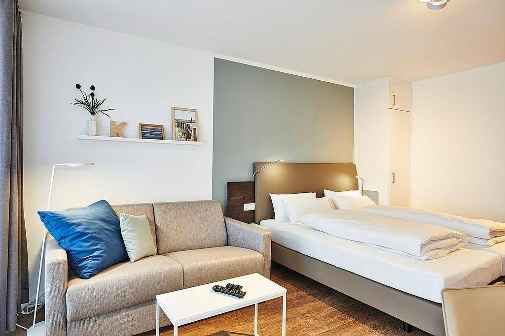 1-Zimmer Apartment in Strandnähe mit Balkon und inkl. Schwimmbad- & Saunanutzung — Bild 4