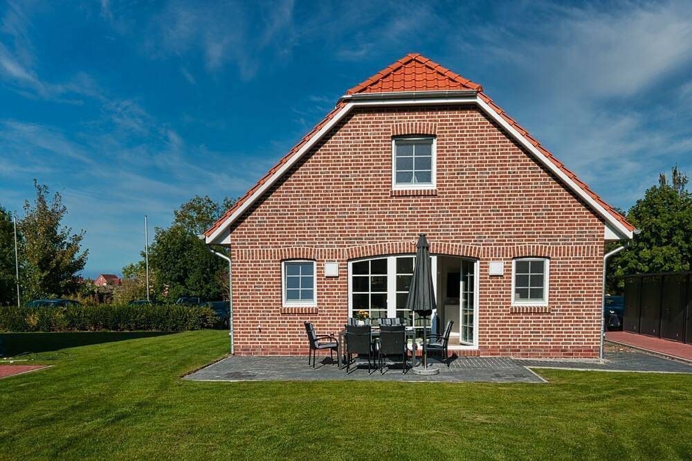 100qm Ferienhaus mit Infrarotkabine, Kamin, Garten & überdachter Terrasse