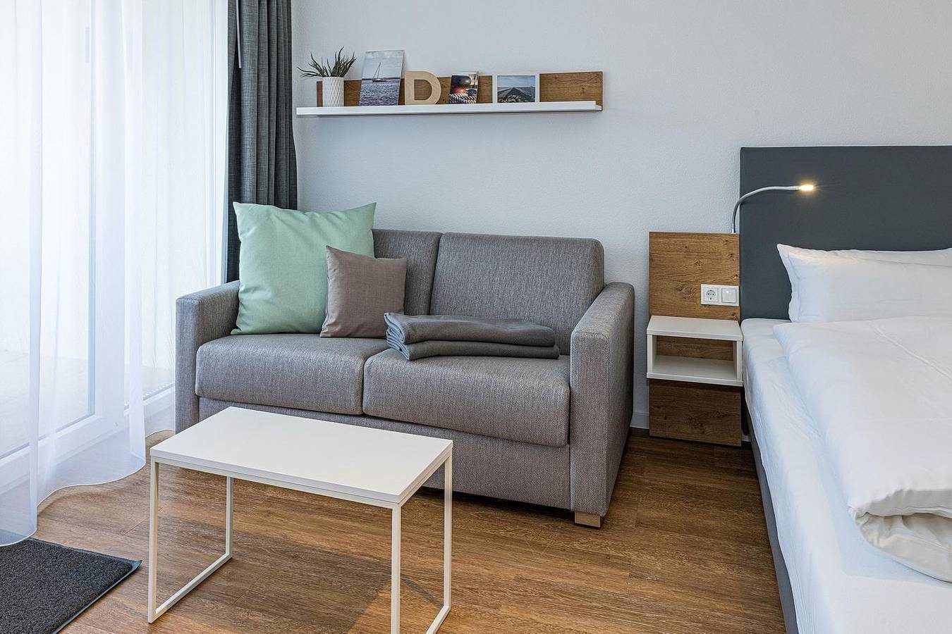 Strandnahes 1-Zimmer Apartment mit Balkon, Parkplatz, Schwimmbad- & Saunanutzung — Bild 2