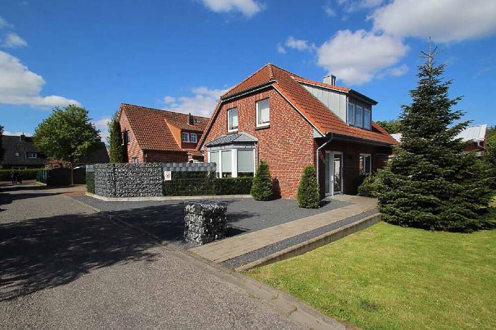 Moderne helle Ferienwohnung mit Kamin und Terrasse — Bild 2