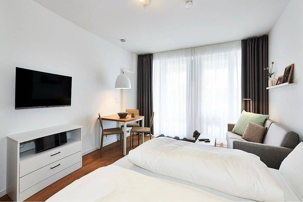 Strandnahes Ferienapartment mit Terrasse inkl. freier Schwimmbad- & Saunanutzung — Bild 2