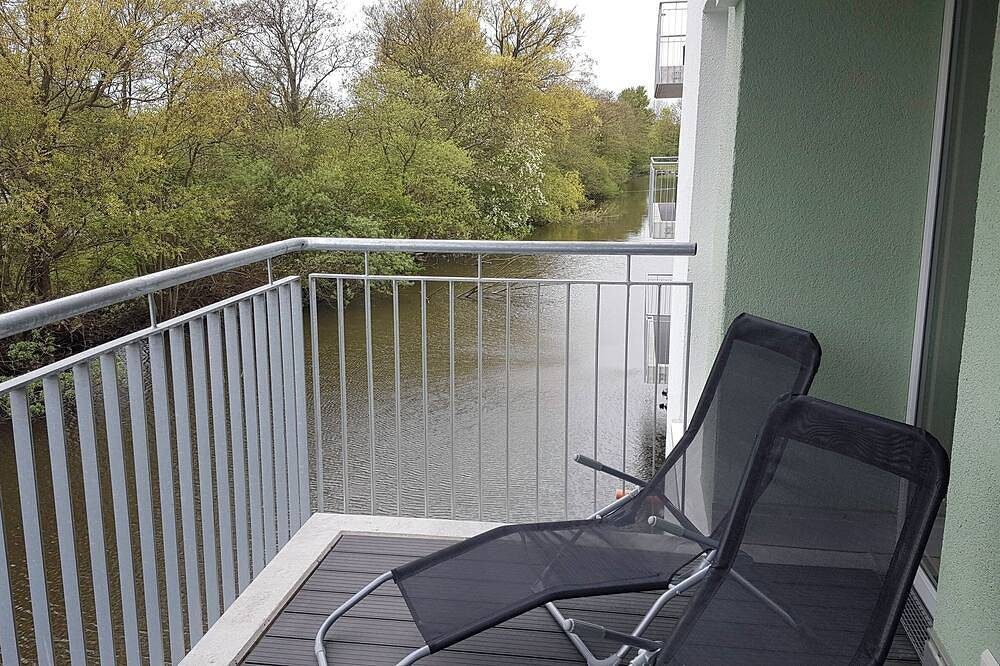 Apartment mit 2 Schlafzimmern, offener Küche, Wohnbereich und Wellnessbad. — Bild 4