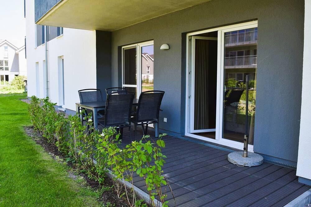 Moderne, hochwertige Ferienwohnung, Erdgeschoss, Sauna, großer Balkon, strandnah — Bild 2