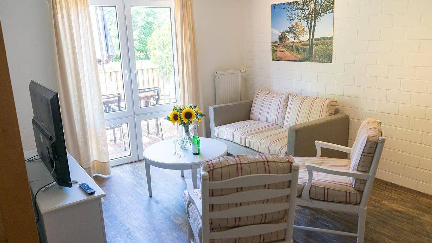 Familienfreundliche Ferienwohnung mit Terrasse und Nähe zum Meer — Bild 2