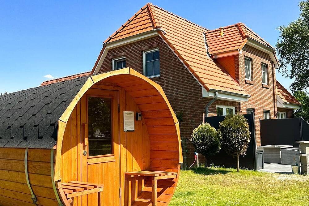 Lüttje Huck Ferienwohnung 1 - mit Seeblick & Sauna — Bild 2