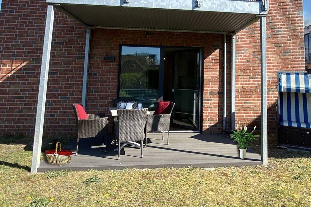 Erdgeschoss Wohnung mit Terrasse und Garten — Bild 2