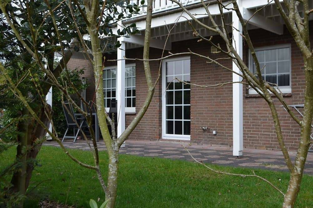 Helle, großzügige Komfortwohnung mit eigenem Garten und begehbarer Dusche. — Bild 2