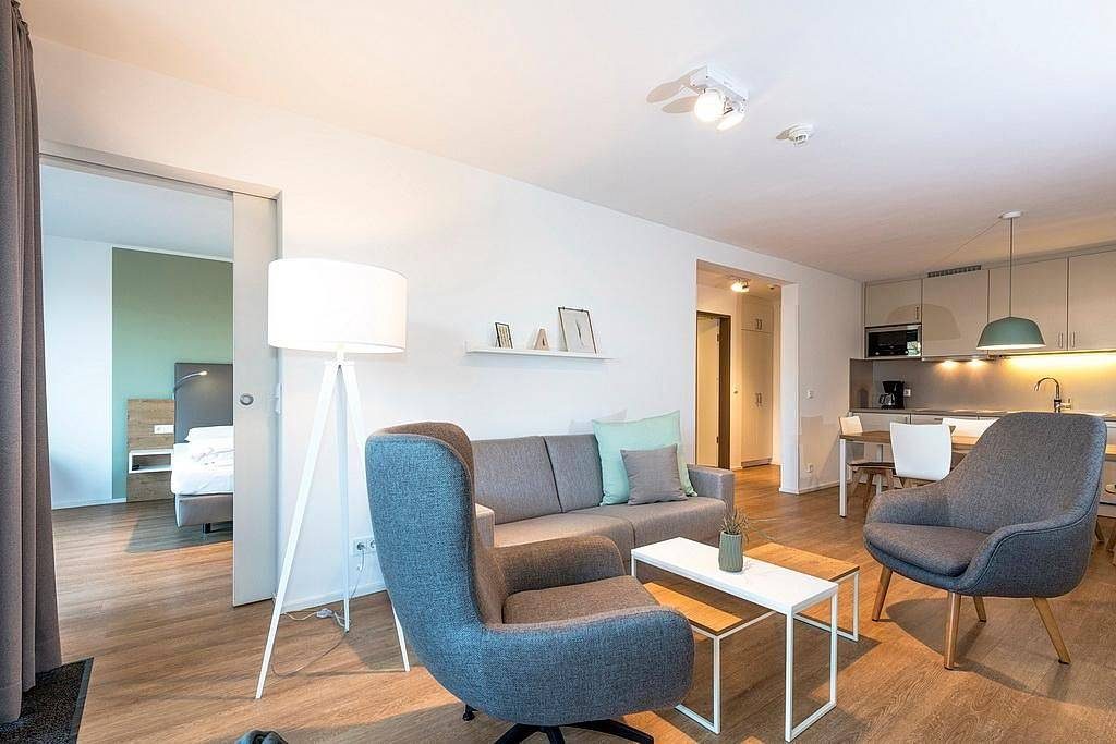 Top Apartment in Strandnähe mit Loggia, Strandkorb, zwei Bädern & Sauna im Haus! — Bild 4
