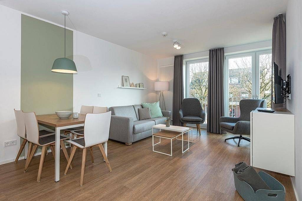 Helles Familienapartment in Strandnähe mit sonniger Loggia & Sauna im Haus!