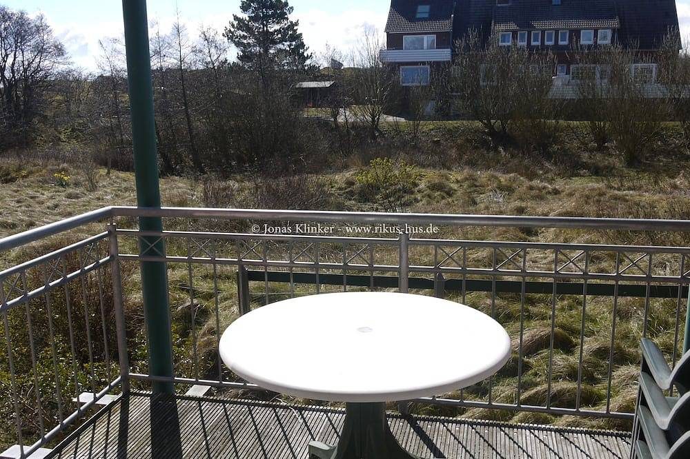 Moderne 2-Zimmer-Wohnung im ruhigen Ostdorf mit Blick ins Naturschutzgebiet — Bild 2