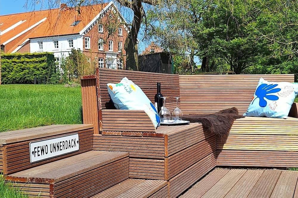 Familienfreundliche Erdgeschosswohnung mit großzügigem Garten und Wasserzugang — Bild 2