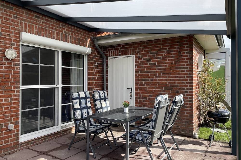 Familienfreundliches Ferienhaus in Deichnähe, Terrasse und Garten — Bild 2