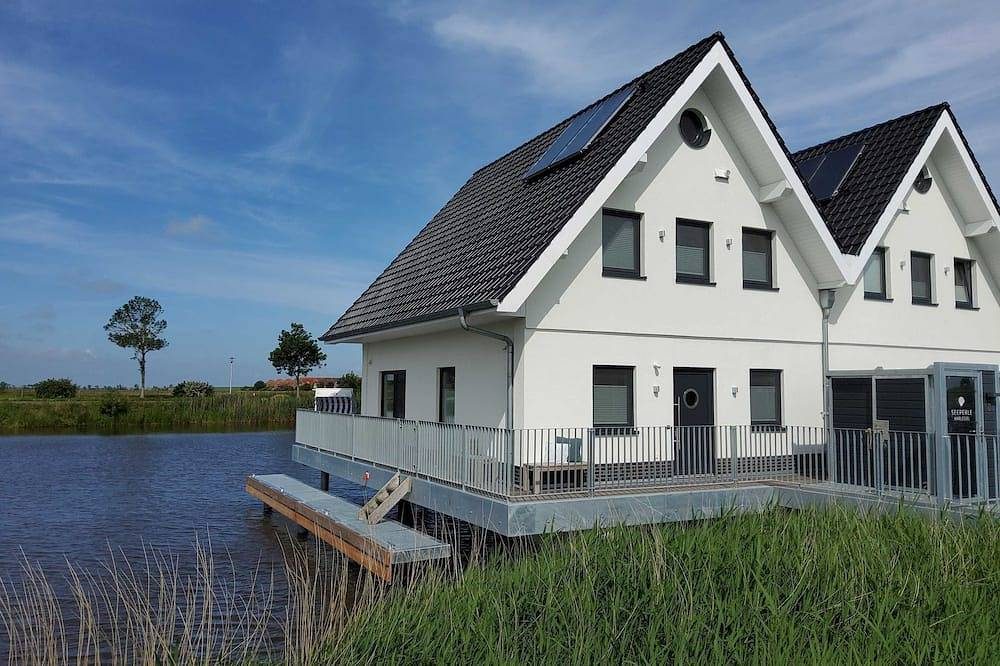 Nr. 110 - Ferienhaus Seeperle \/ Pfahlhaus auf der Harle - Nr. 110 - Exklusives Wohnen auf der Harle