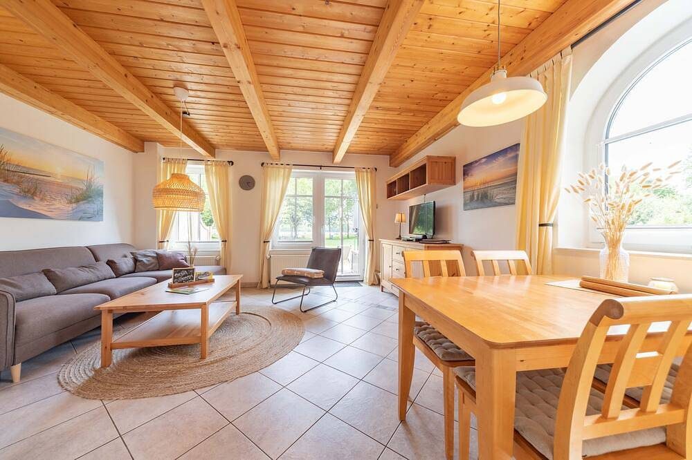 Lüttje Huck Ferienwohnung 1 - mit Seeblick & Sauna