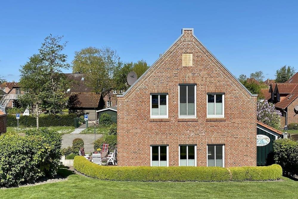 freistehendes Ferienhaus mit Terrasse& eigenem Garten, Wlan & toller Hafenblick — Bild 2