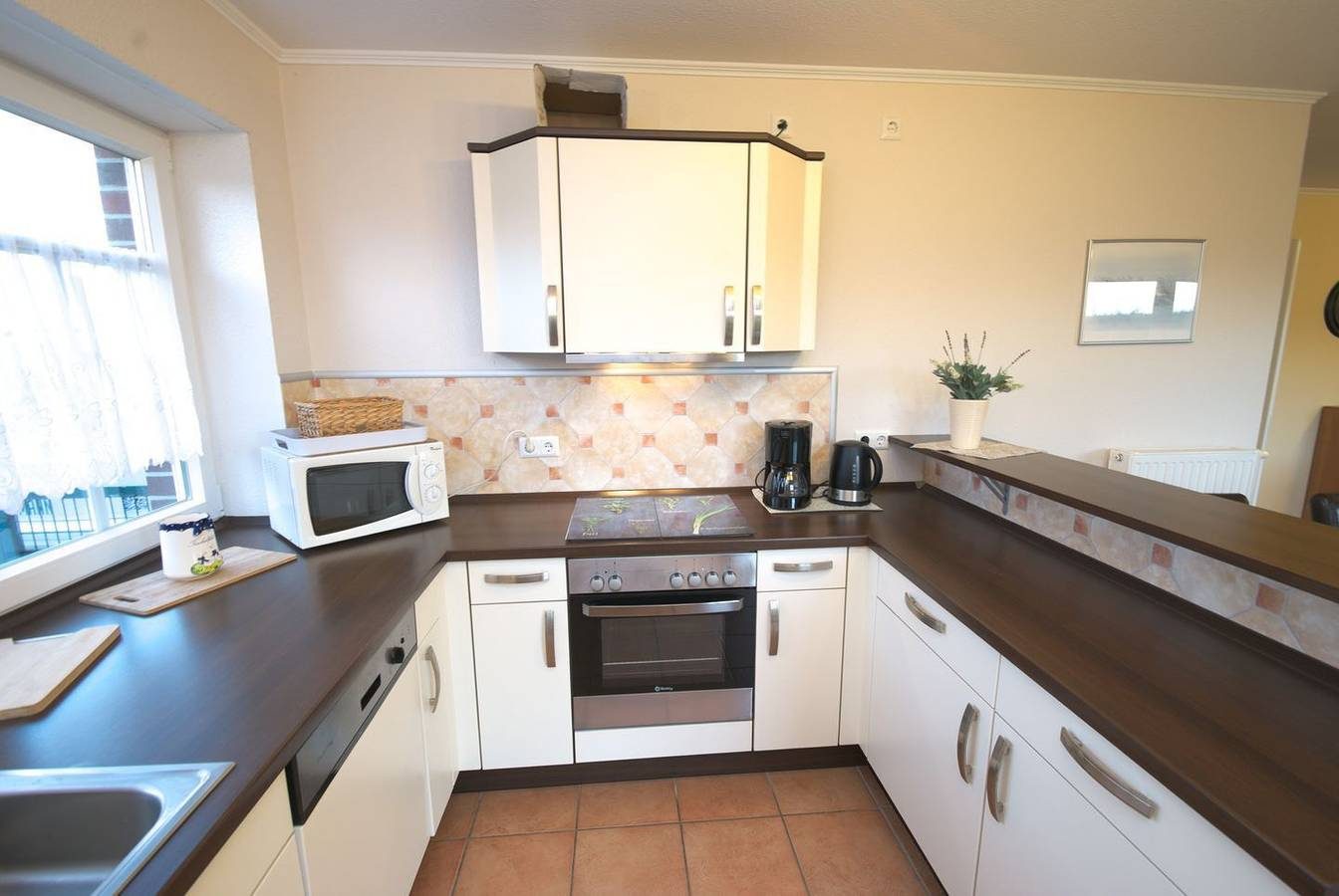 Strandnahe Ferienwohnung für 4 Personen in Norddeich mit Deichblick und Garten — Bild 4