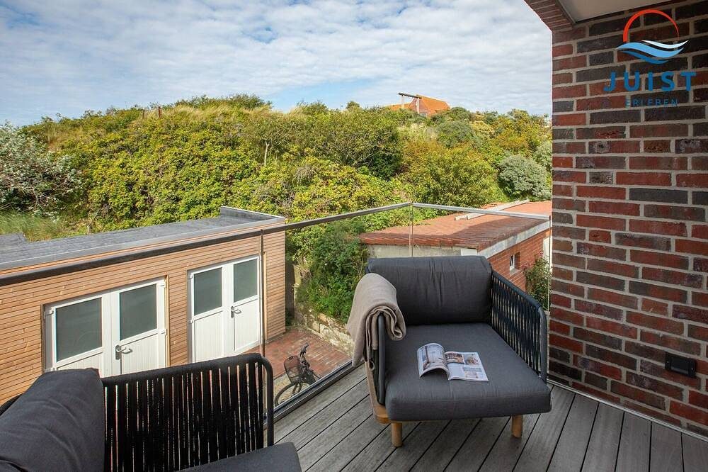 Moderne familienfreundliche Ferienwohnung mit Balkon in Wattnähe — Bild 3