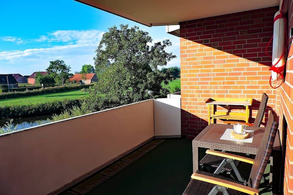 Cute upper apartment Lüttje Nest with a view of the canal — Bild 2